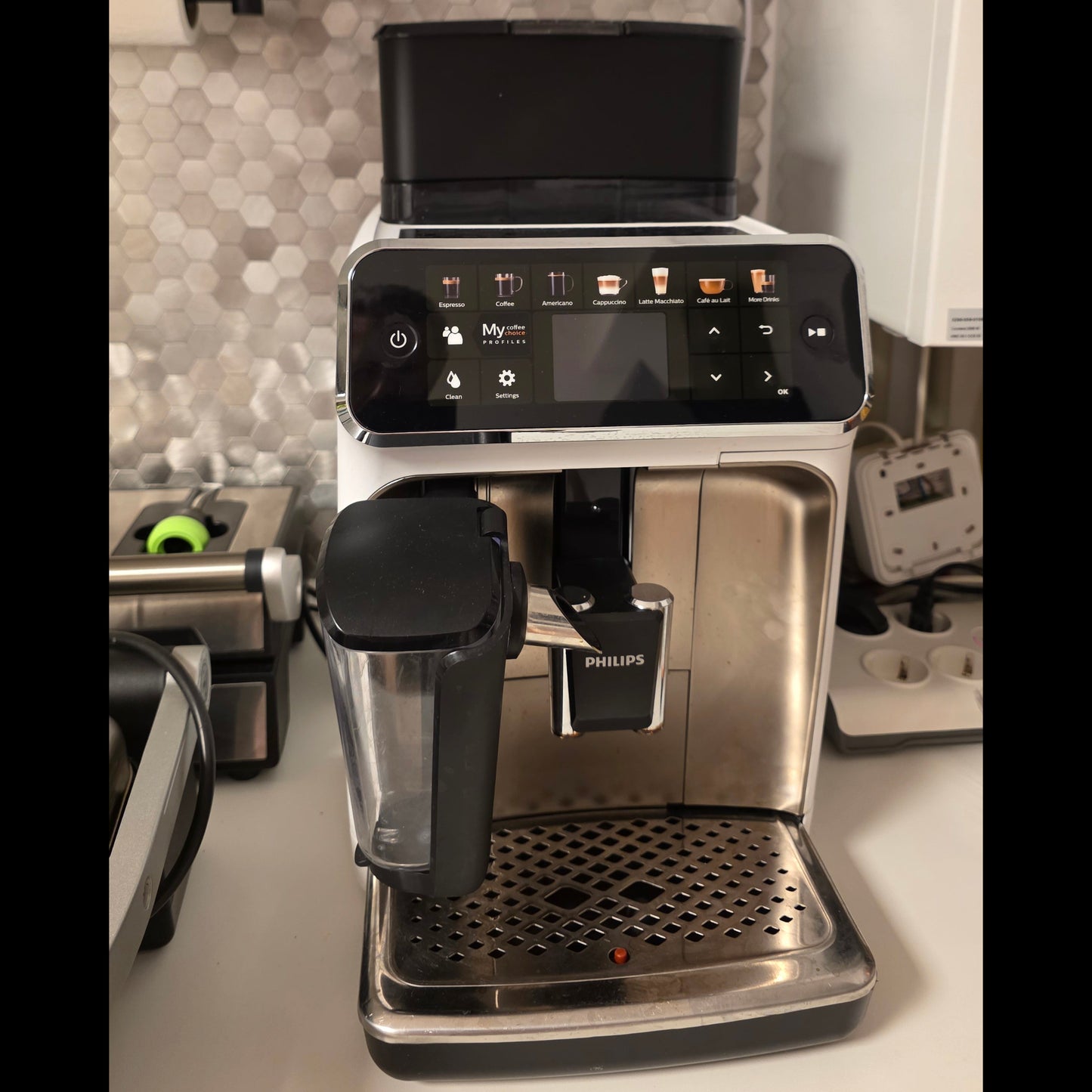 Espresso machine with digital display on a kitchen counter
