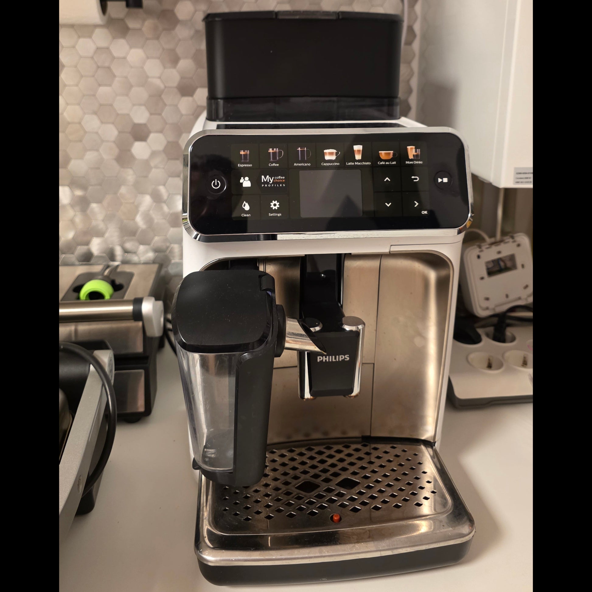 Espresso machine with digital display on a kitchen counter