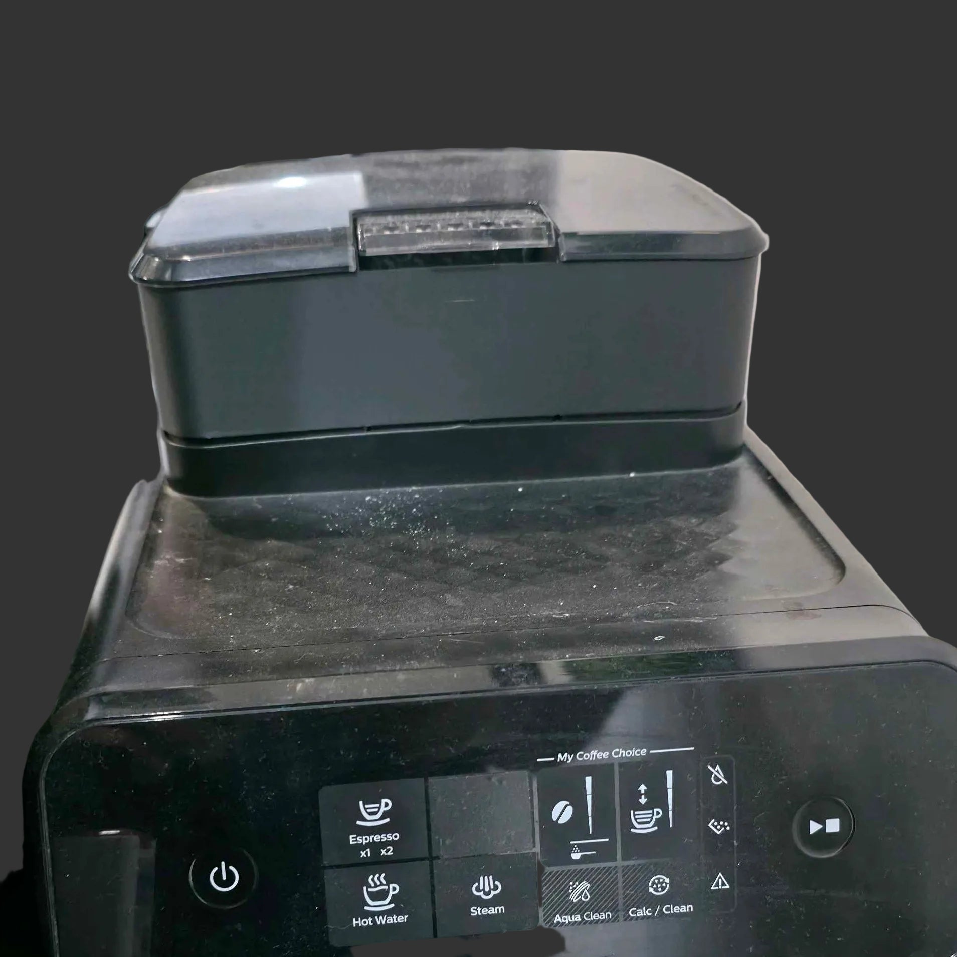 Black appliance with control panel on a kitchen counter