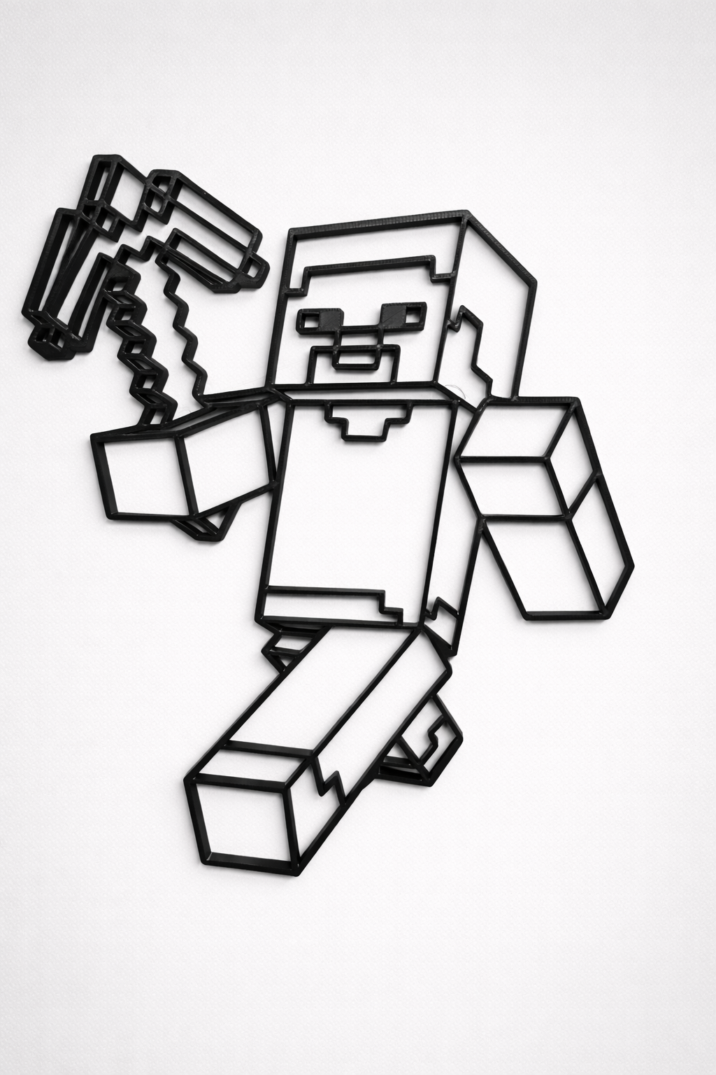 Black and white pixelated character holding a pickaxe on a white background